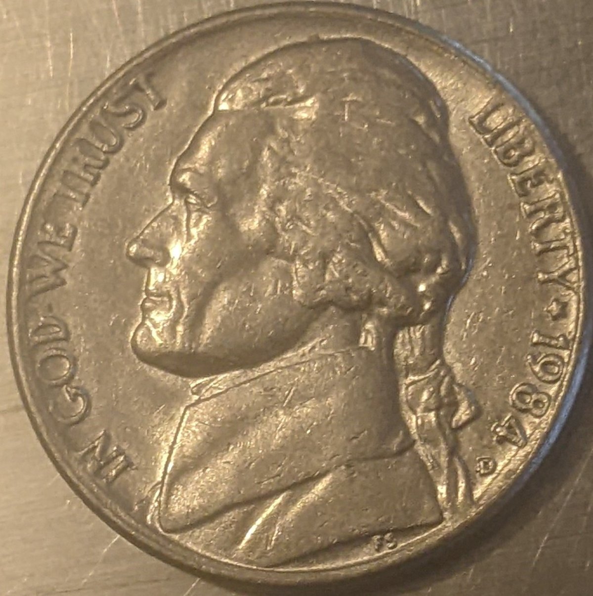 1984-Nickel-With-Collar-Error?-There's-A-Raised-Part-Of-The-Rim-Blow-The-Four