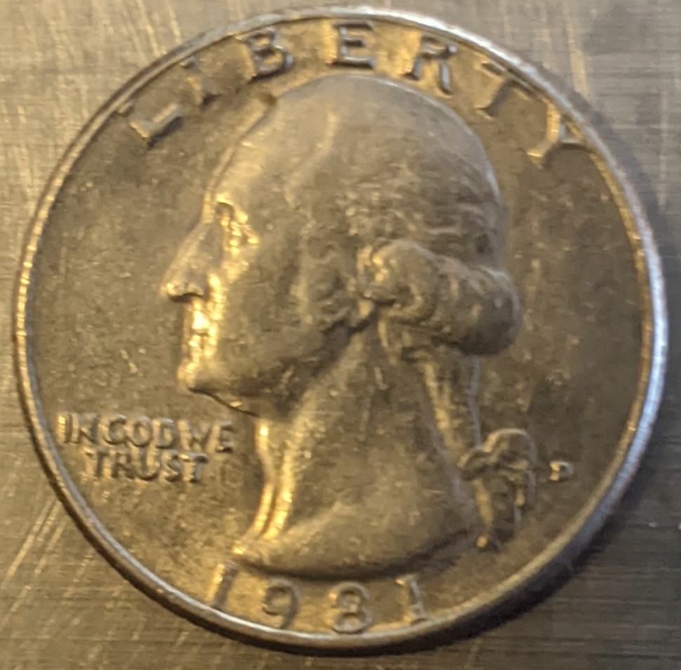 1981-Quarter-With-Collar-Clash-Left-Side-Rim-Of-The-Face-Of-The-Coin?