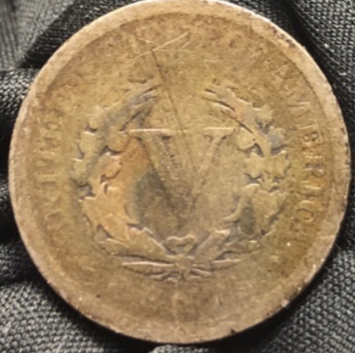 1905-V-Nickel---Strike-Through-W/Lincoln-Cent...very-Copper-Looking?