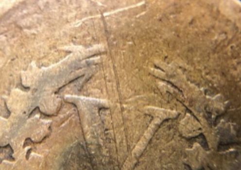 1905-V-Nickel---Strike-Through-W/Lincoln-Cent...very-Copper-Looking?