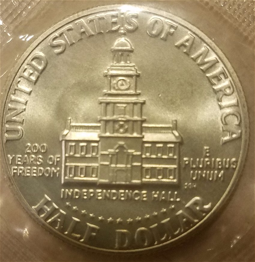 1989-Quarter-Struck-On-1976-Bicentennial-Kennedy-Half-Dollar