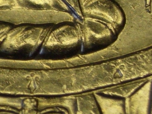 2012-50c-Saw-Tooth-Marks---Need-Help-Identifying-These-Marks