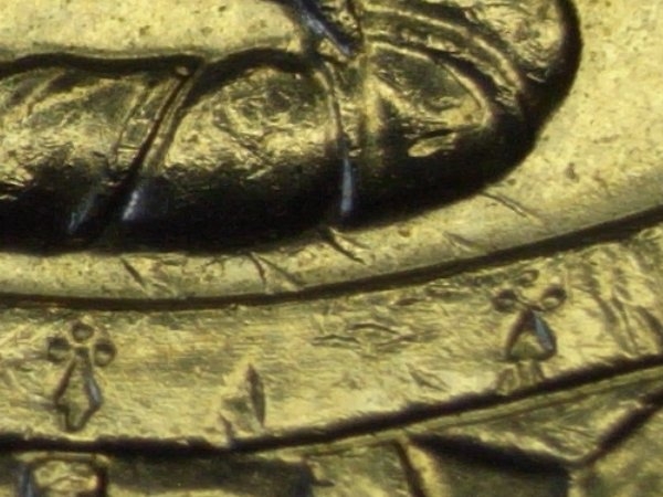 2012-50c-Saw-Tooth-Marks---Need-Help-Identifying-These-Marks