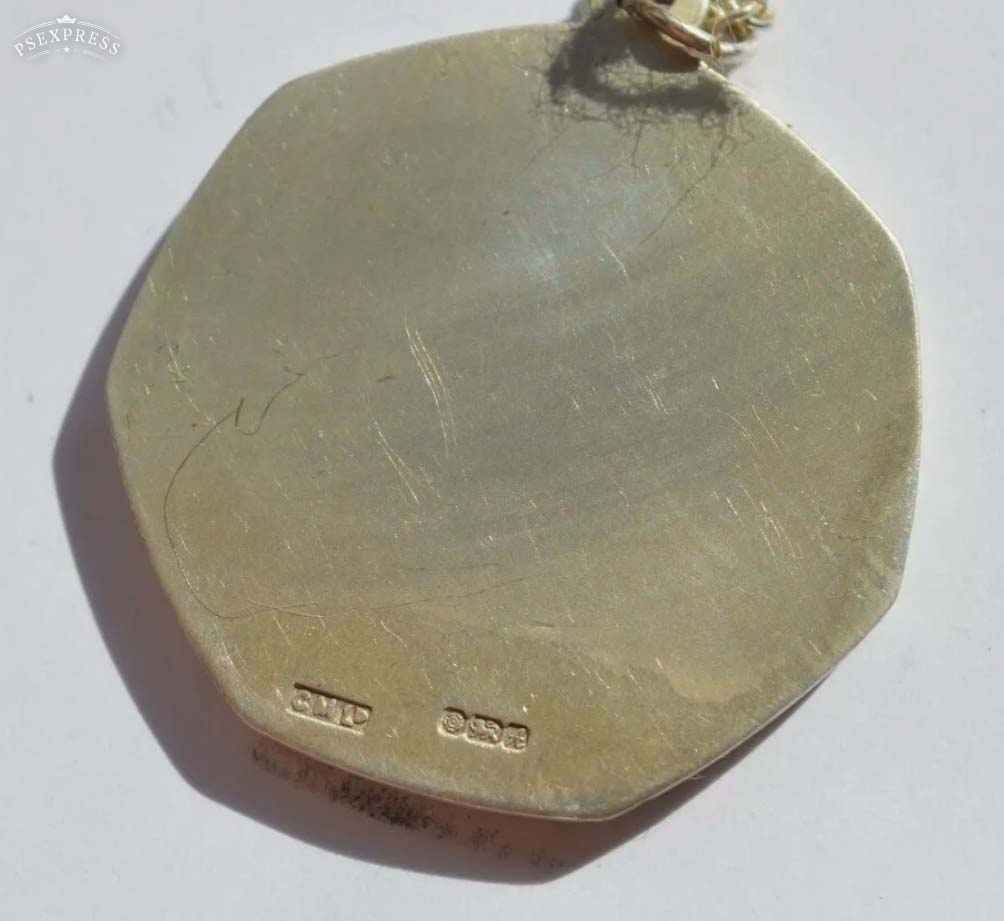 Any-Infomation-On-This-7-Sided-Silver-Token-Linked-With-Phillips?