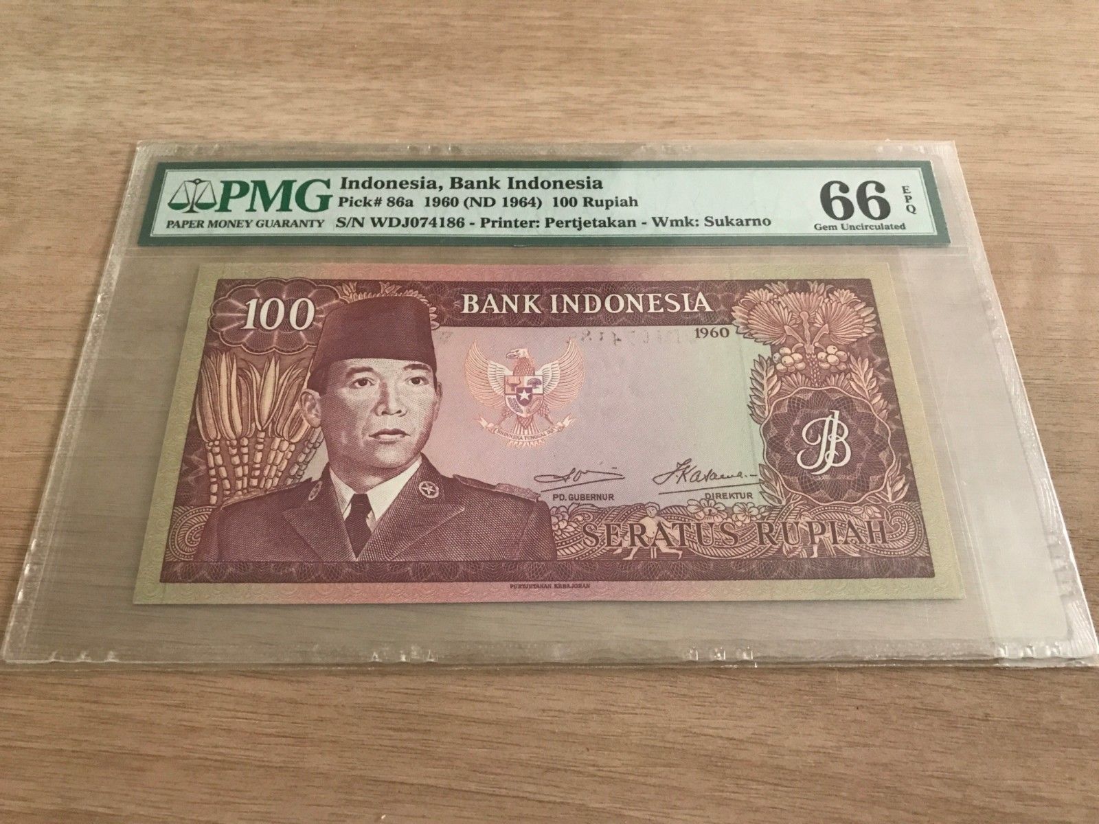 Stolen-Banknote---Indonesia,-1960,-100-Rupiah,-PMG-66EPQ,-Watermark-Error