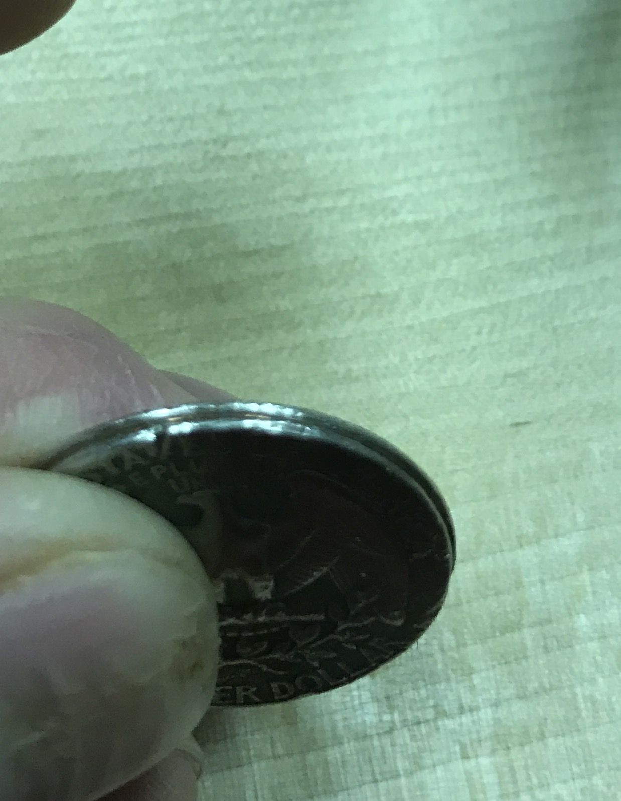 77-Quarter-With-Missing-Edge:-Error-Coin-Or-Damage?