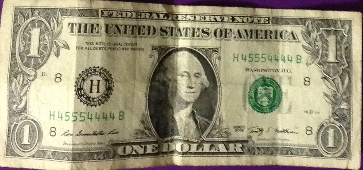 1-Dollar-Bill-And-Serial-Number...