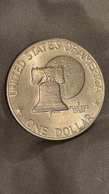 Eisenhower-Bicentenniel-Dollar-With-A-Die-Crack-Or-Lamination-Error?