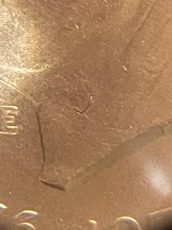 Eisenhower-Bicentenniel-Dollar-With-A-Die-Crack-Or-Lamination-Error?