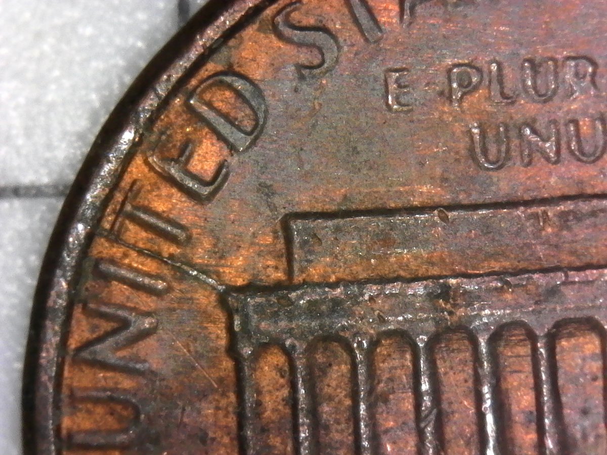 Two-Die-Cracks-On-Both-Edges-Of-Building?---1983-LMC