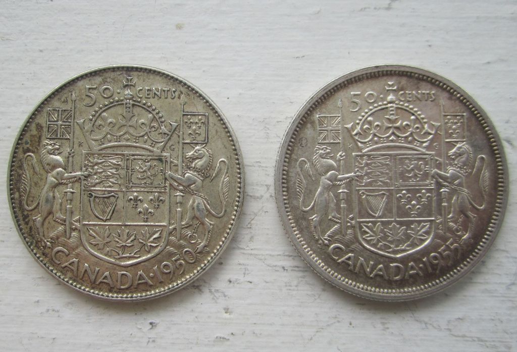 Strange-1955-50-Cents---Mad-Or-Double-Rim-?