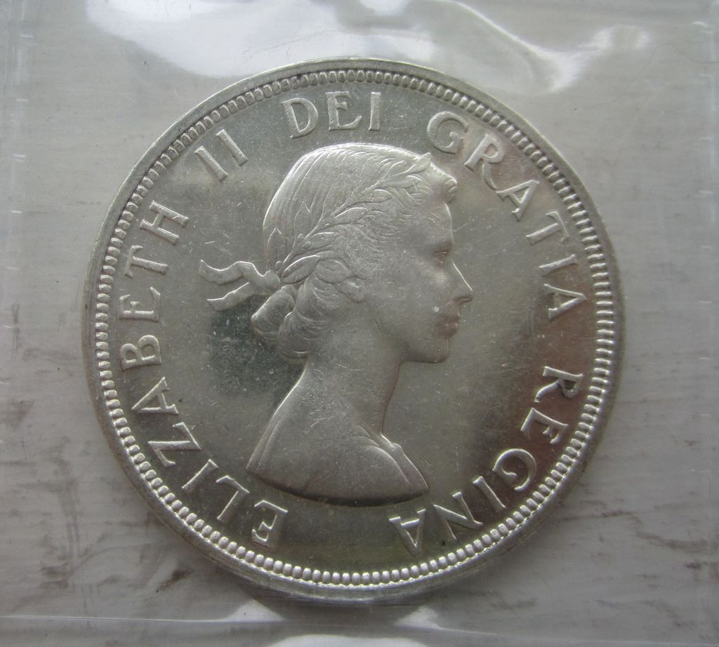 Can.-Dollar-1953---Guess-The-Grade