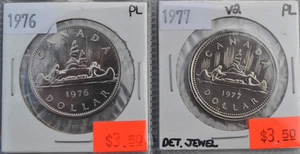 Let's-Play-Spot-The-Difference,-1976-Vs-1977-Voyageur-Dollar