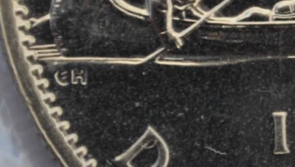Let's-Play-Spot-The-Difference,-1976-Vs-1977-Voyageur-Dollar