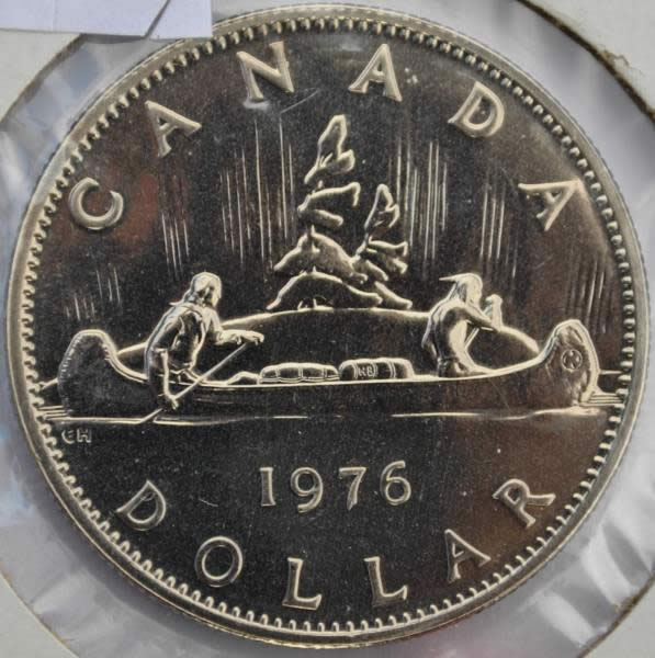Let's-Play-Spot-The-Difference,-1976-Vs-1977-Voyageur-Dollar