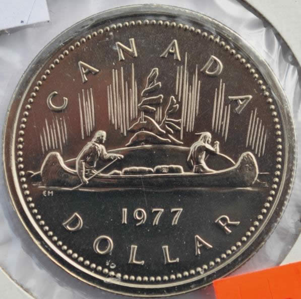 Let's-Play-Spot-The-Difference,-1976-Vs-1977-Voyageur-Dollar
