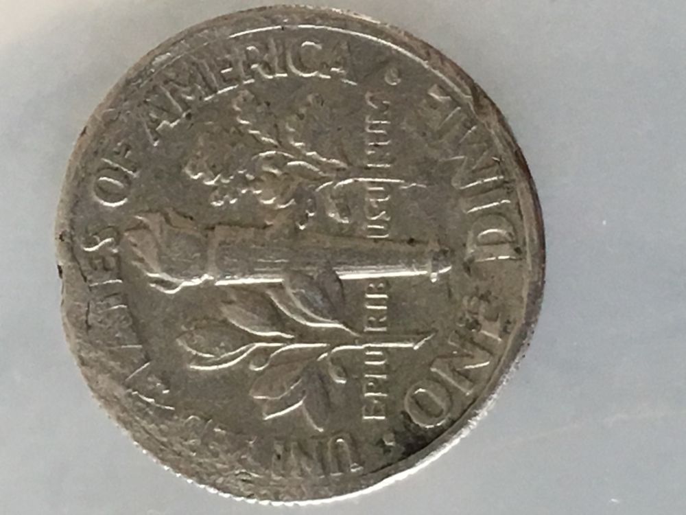 Can-Someone-Please-Help-Me-Understand-What-Happened-To-This-Poor-Coin?