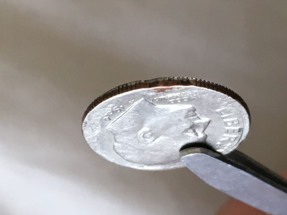 Can-Someone-Please-Help-Me-Understand-What-Happened-To-This-Poor-Coin?