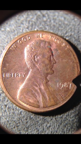 1987-LMC-Bite-Out-Of-Coin?