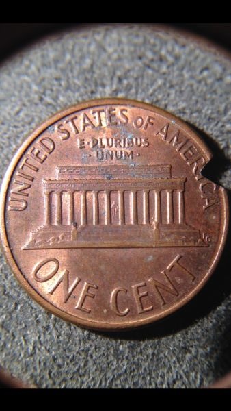 1987-LMC-Bite-Out-Of-Coin?