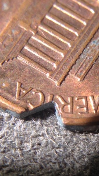 1987-LMC-Bite-Out-Of-Coin?