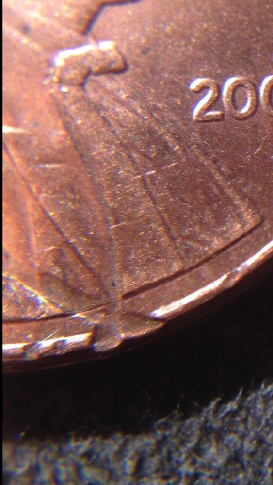 2001-LMC-Obverse-Damage/Incuse-Letters-Garage-Job?