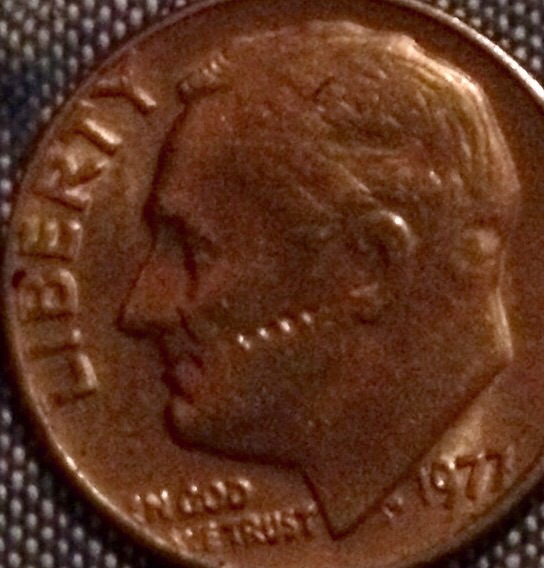 1977-Roosevelt-Dime-Stitches-On-Face