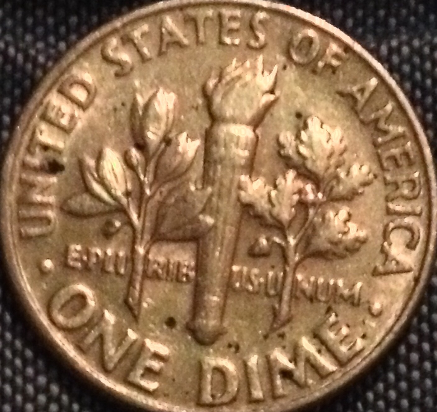 1977-Roosevelt-Dime-Stitches-On-Face