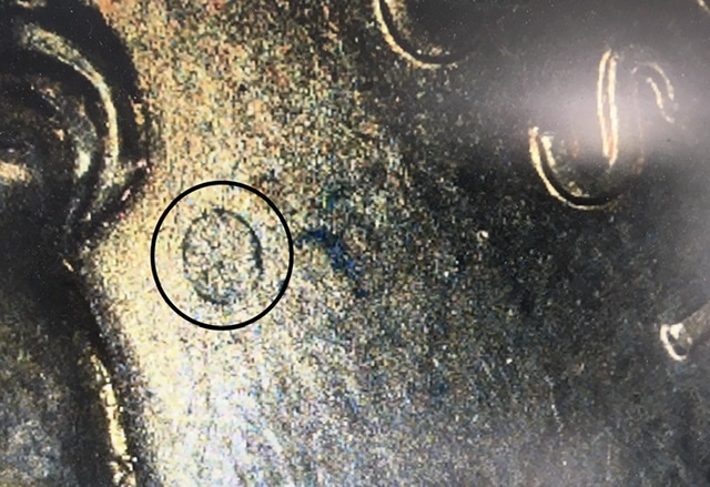 1982-LMC-Strange-Raised-Circles-On-Obverse