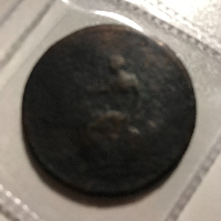 Unknown-Head-On-Very-Old-Coin.