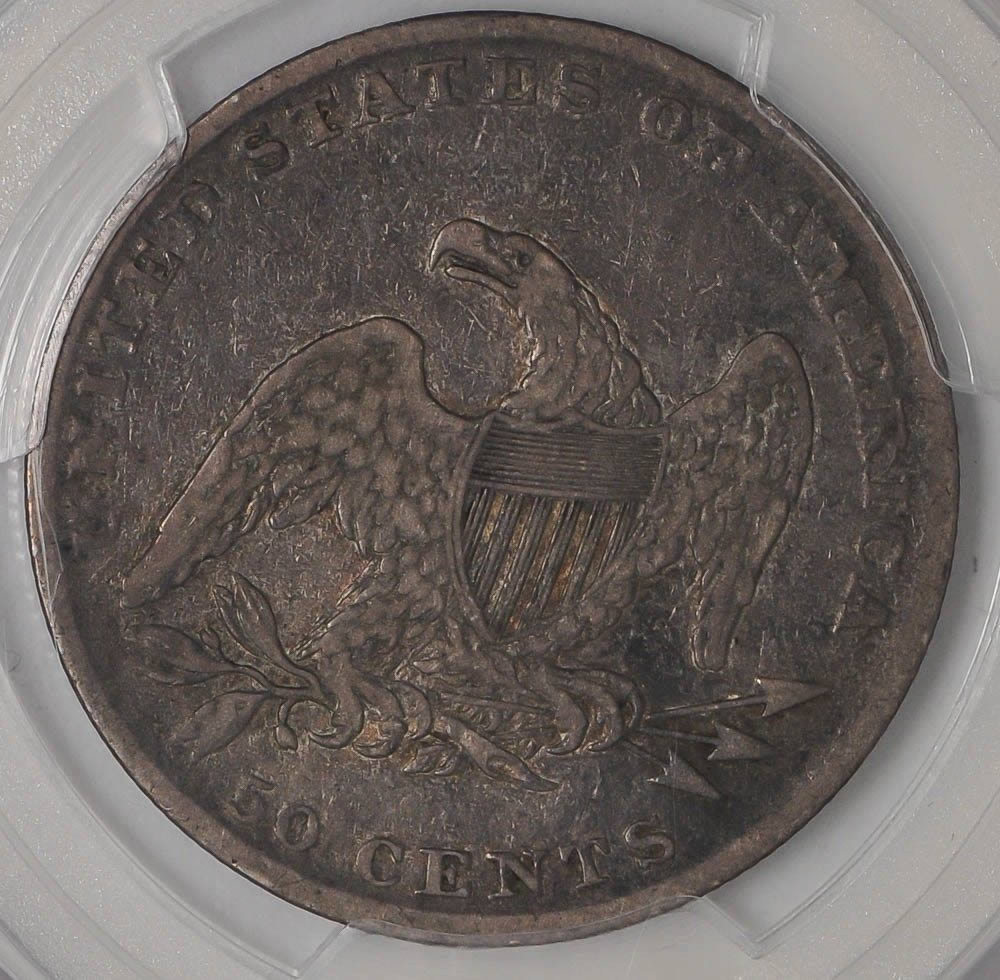2-Reeded-Edge-Capped-Bust-Halves