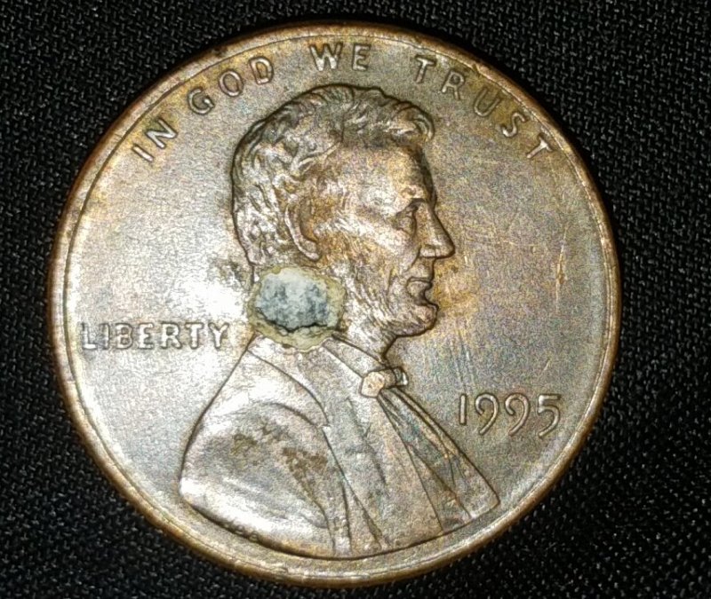 1995-Penny-With-Hole.-Faulty-Metal?-Acid?