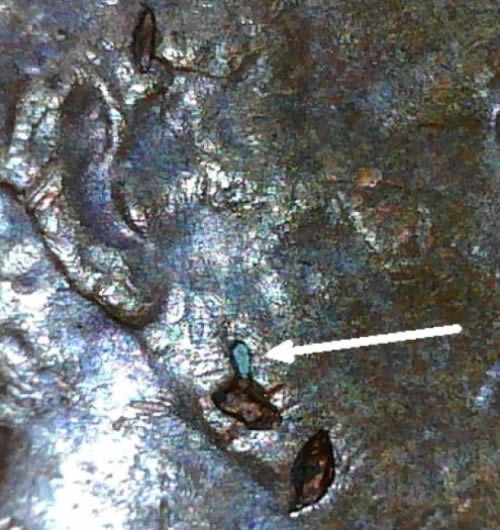 Strike-Through-With-Embedded-Debris?