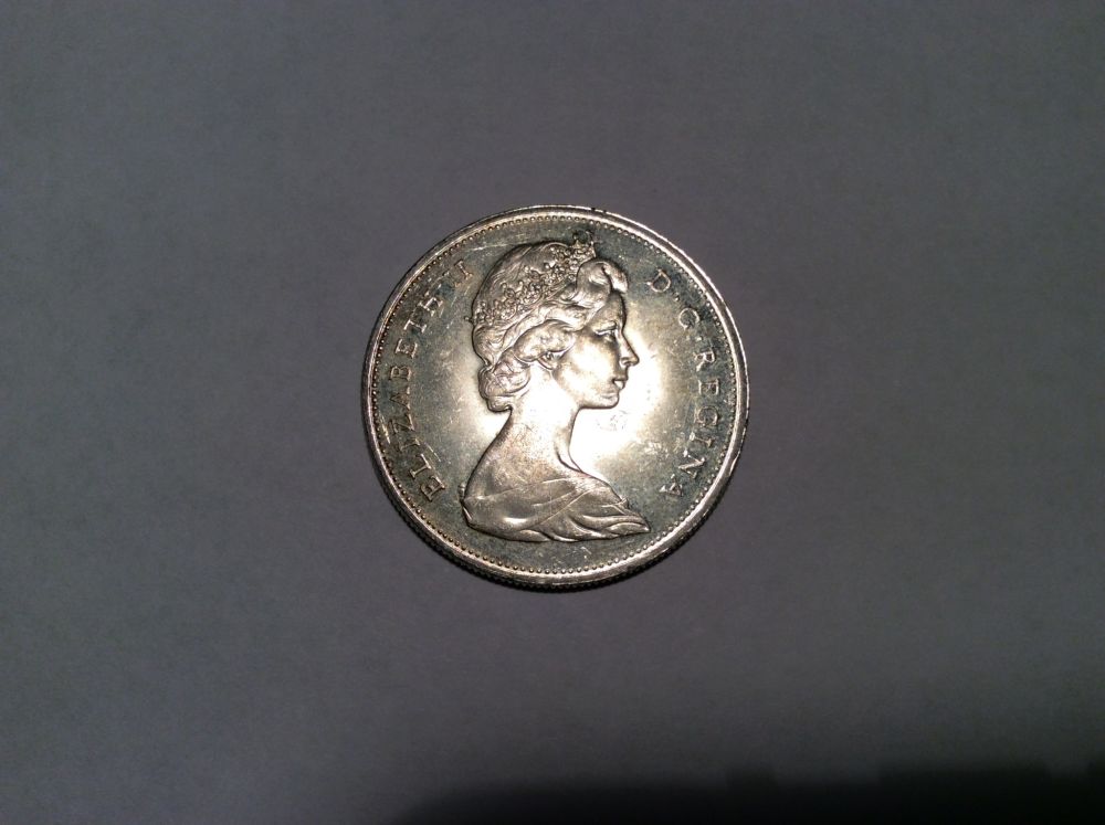 Help-Grade-1965-Dollar