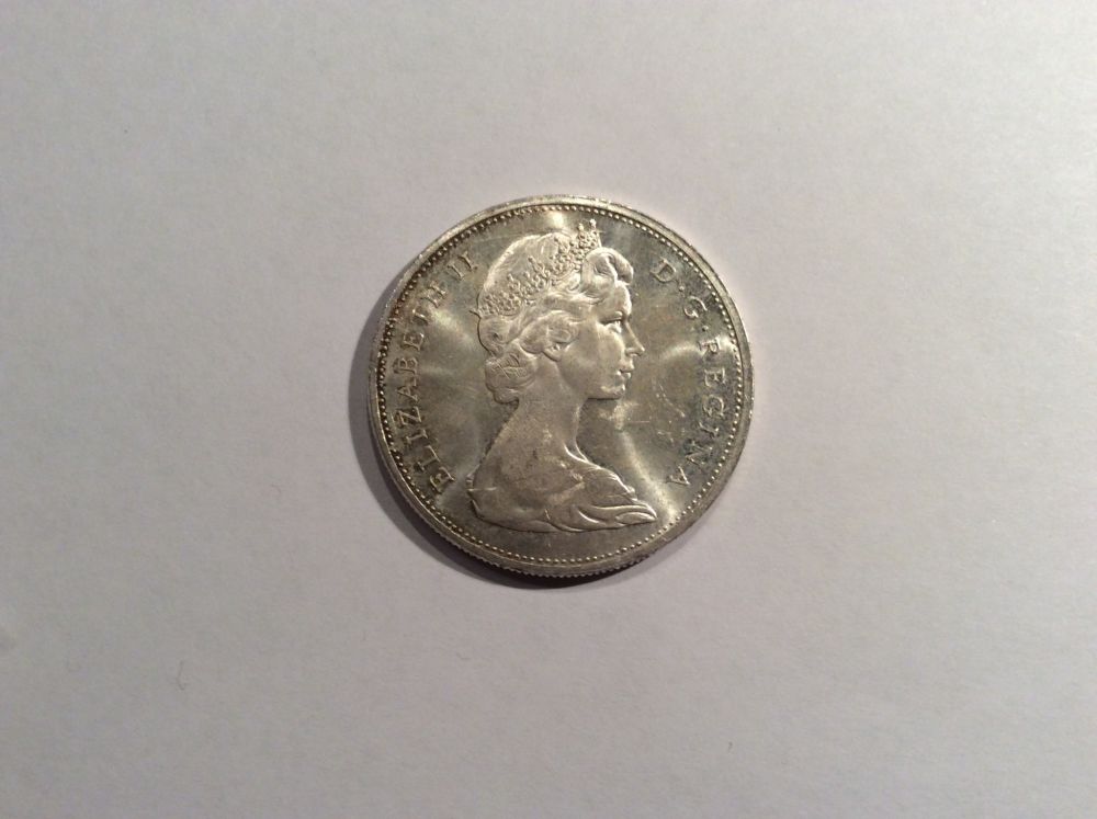 Help-Grade-1965-Dollar