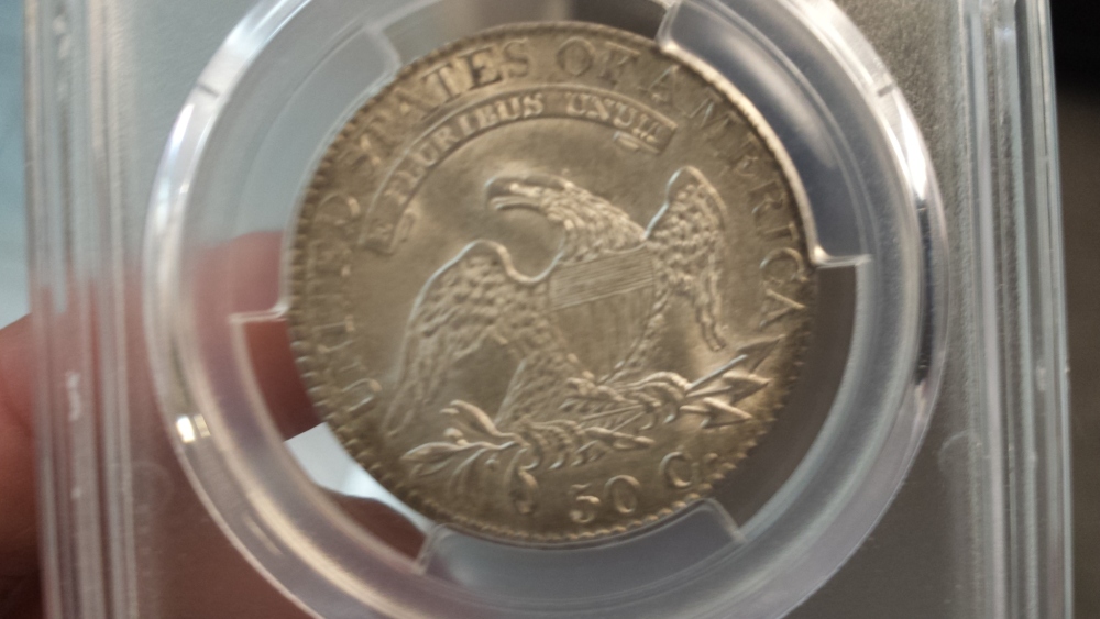 Can-You-Help-Me-Choose?-1825-Capped-Bust-Half-Dollar