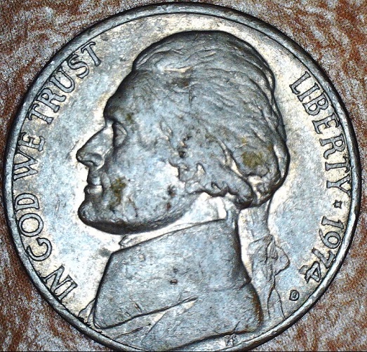 1974-D-Nickel-With-Part-Of-4-Missing.