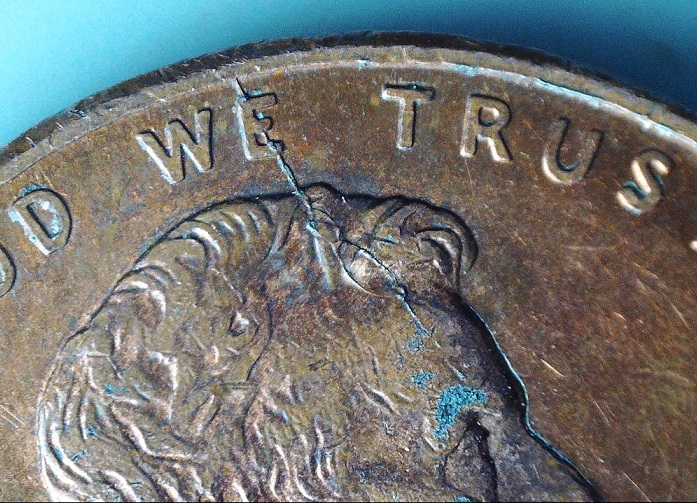1998-Penny-Cracked-Die-Spike-Head?