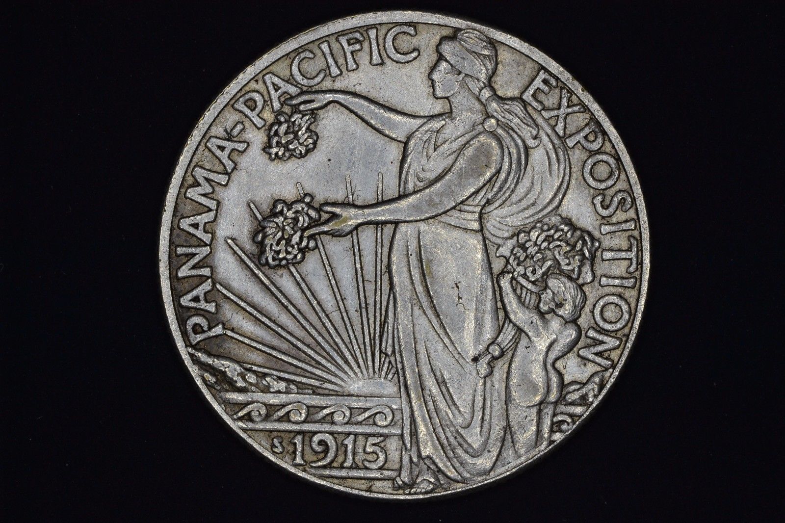 Why-Do-So-Many-1915-Panama-Pacific-Commemorative-Halves-Have-Rings?
