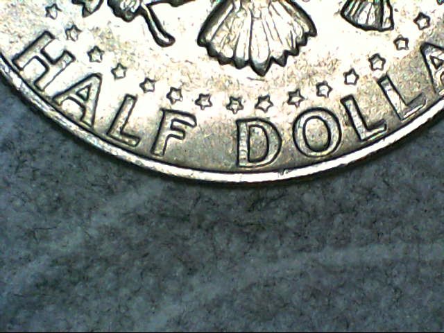 1980-D-Kennedy-Half-Dollar.-The-Devices-Looks-Smeared-Or-3-D.