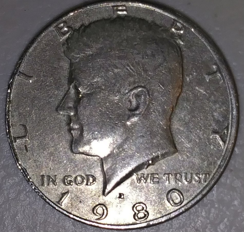 1980-D-Kennedy-Half-Dollar.-The-Devices-Looks-Smeared-Or-3-D.