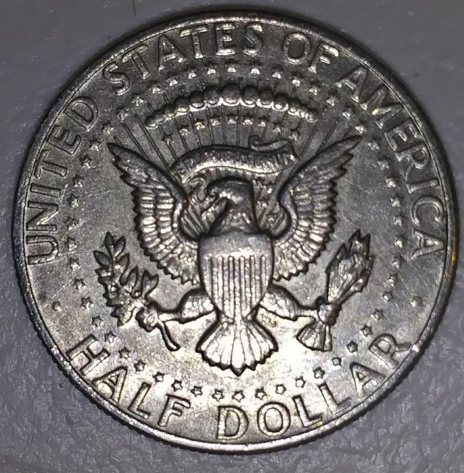 1980-D-Kennedy-Half-Dollar.-The-Devices-Looks-Smeared-Or-3-D.