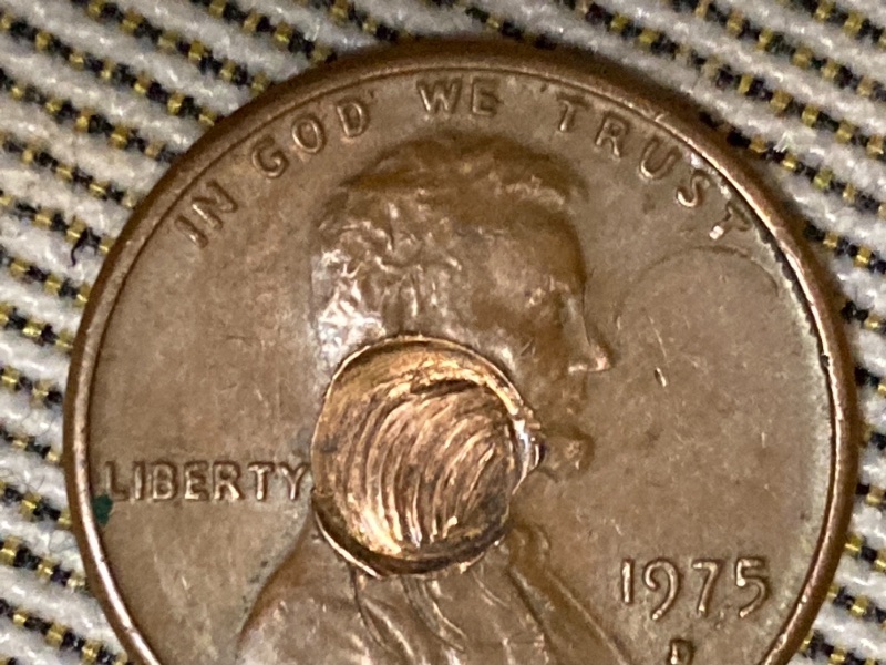 1975-Did-Someone-Shoot-This-With--A-Bb-Or-Is-It-An-Actual-Error?