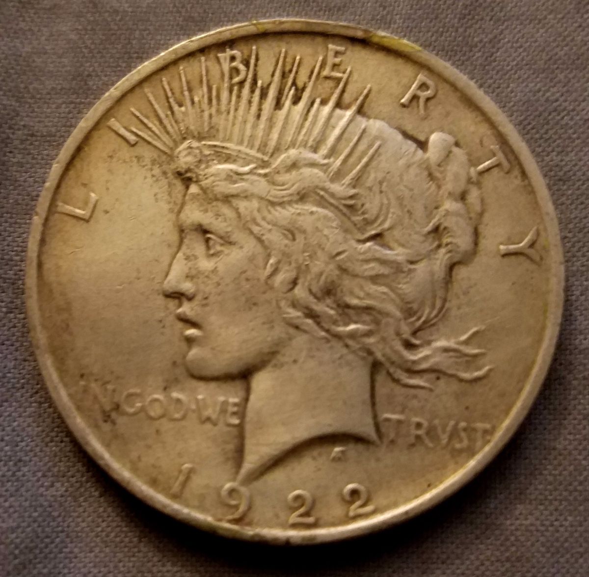 Why-Would-My-1922-Peace-Dollar-Be-Peeling?