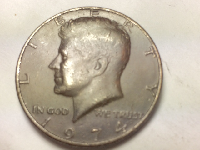 Would-This-74-Kennedy,-Clad-Layer-Missing-Worth-Grading?