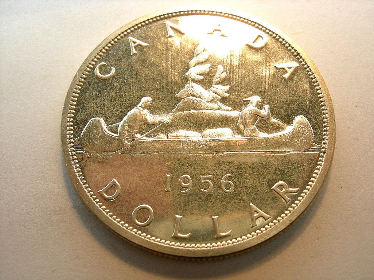 Was-Wondering-What-Causes-This-Kind-Of-Colour-To-A-Silver-Dollar-?