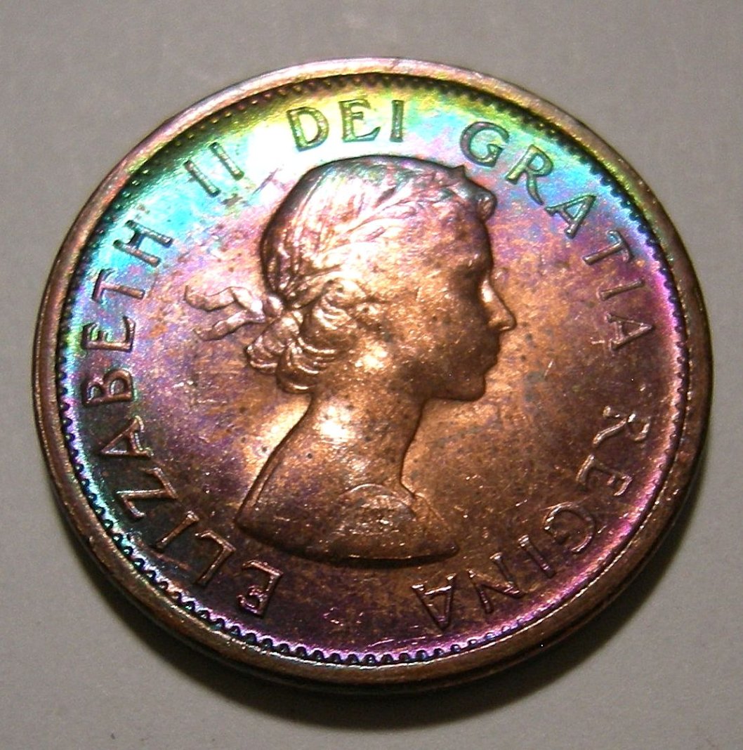 What-Could-Cause-Extreme-Shades-Of-Aqua-Blue-And-Violet-On-George-VI--Cent?