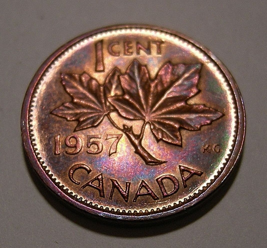 What-Could-Cause-Extreme-Shades-Of-Aqua-Blue-And-Violet-On-George-VI--Cent?