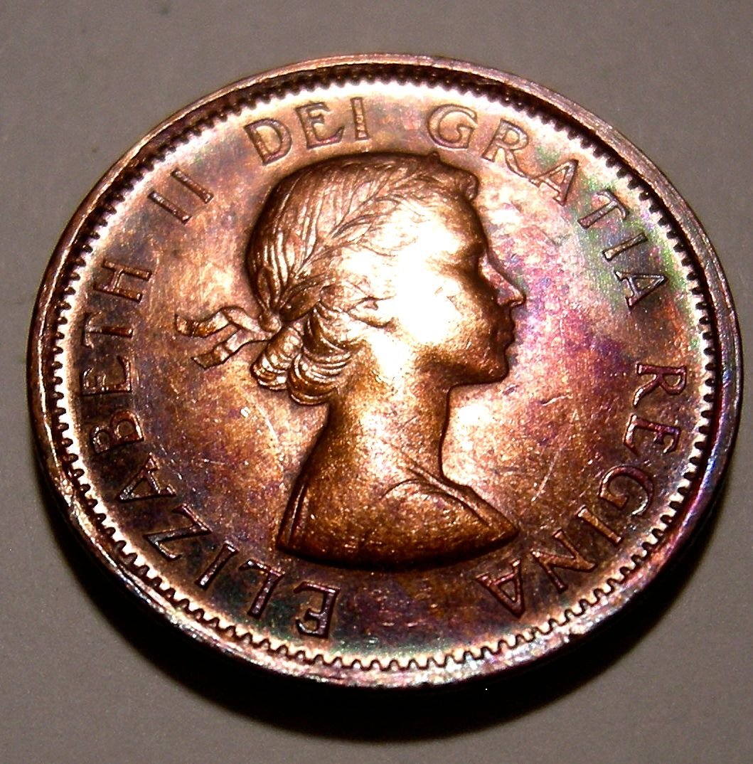 What-Could-Cause-Extreme-Shades-Of-Aqua-Blue-And-Violet-On-George-VI--Cent?