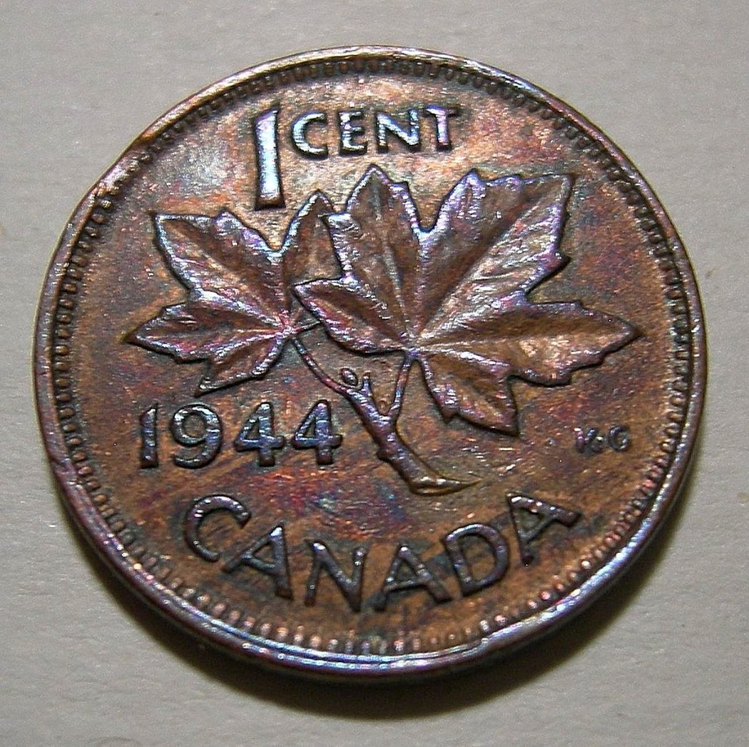 What-Could-Cause-Extreme-Shades-Of-Aqua-Blue-And-Violet-On-George-VI--Cent?